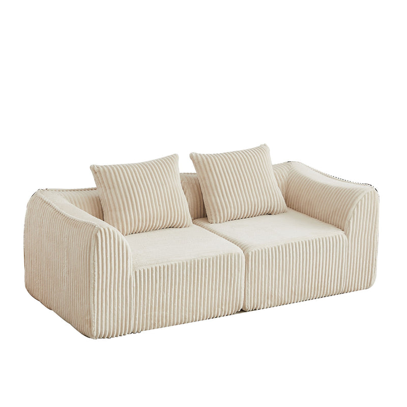 Minimalist Sofa With Curved Lines And Horn Shaped Throw Pillows